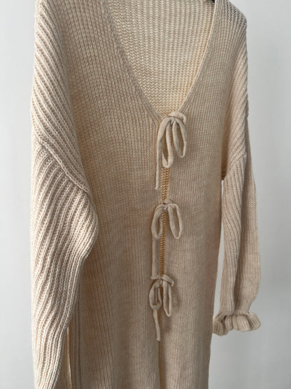 STRICKJACKE MIT SCHLEIFEN